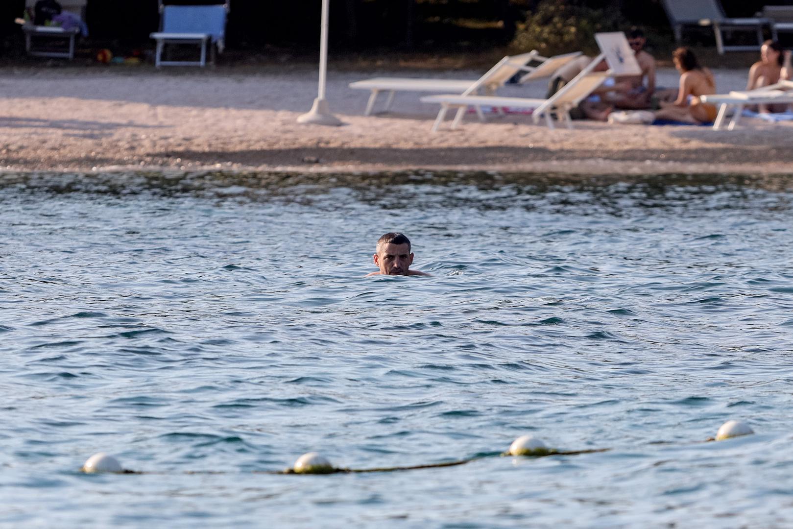 18.07.2024., Petrčane - Arijan Ademi odmara na plazi u Punta Skali Photo: Sime Zelic/PIXSELL