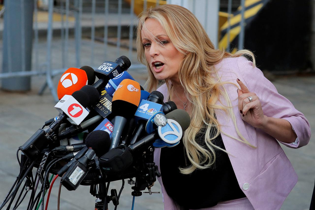 FILE PHOTO: Adult-film actress Stephanie Clifford, also known as Stormy Daniels, speaks as she departs federal court in the Manhattan borough of New York City