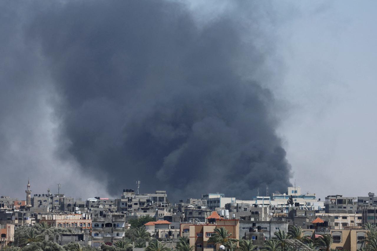 Smoke rises during an Israeli air strike, in Rafah