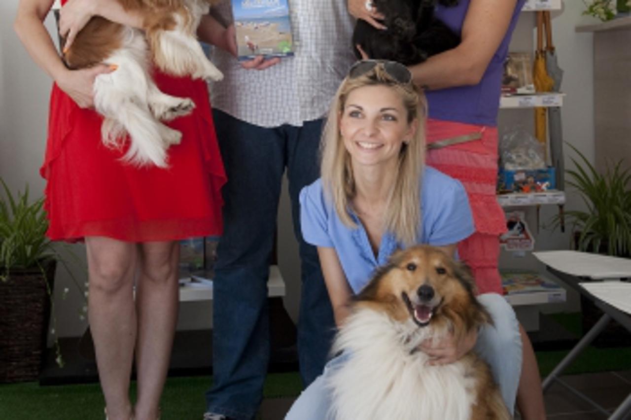 '03.08.2013., Zagreb -  U Udruzi Zagrebacki zivotinjski kutak predstavljena je knjiga Sandre i Zeljka Stuica o najboljim odredistima na hrvatskoj obali za ljetovanje s kucnim ljubimcima. Photo: Davor 