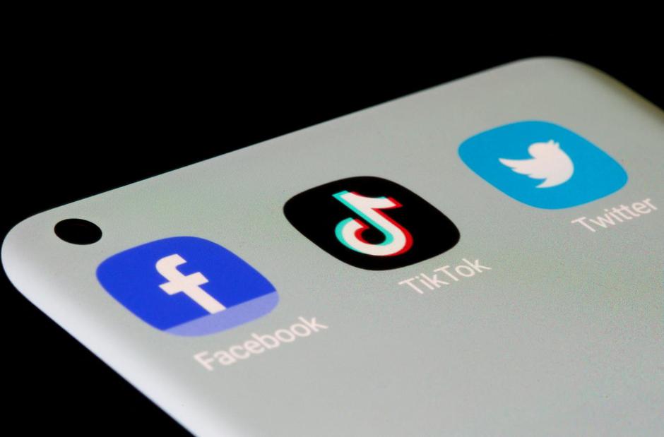 FILE PHOTO: Facebook, TikTok, Twitter apps are seen on a smartphone in this illustration