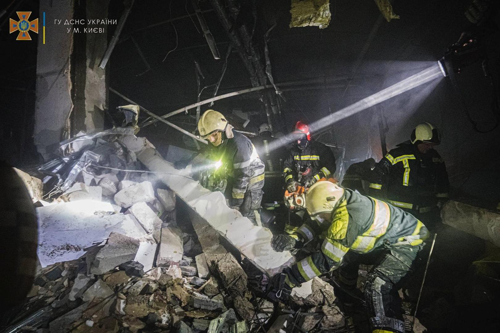 Rescuers work at the site of a shopping mall damaged by an airstrike, as Russia's attack on Ukraine continues, in Kyiv, Ukraine, in this handout picture released March 21, 2022.  Press service of the State Emergency Service of Ukraine/Handout via REUTERS ATTENTION EDITORS - THIS IMAGE HAS BEEN SUPPLIED BY A THIRD PARTY. Photo: State Emergency Service/REUTERS