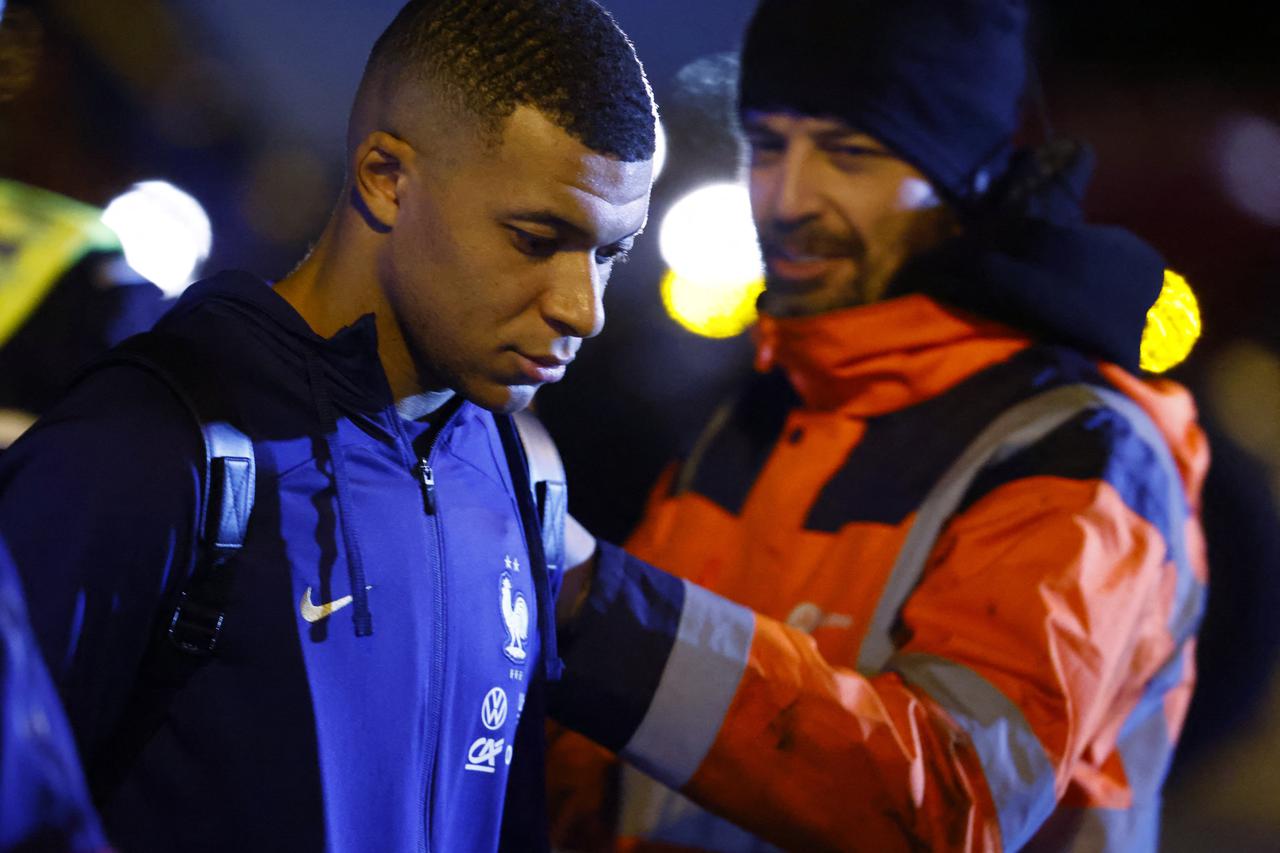 France arrive at Paris Charles de Gaulle Airport after losing in the World Cup Final against Argentina