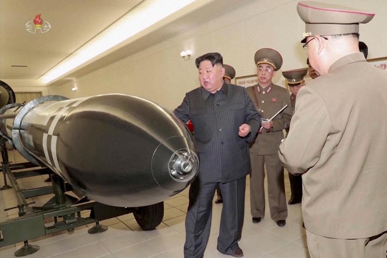 North Korean leader Kim Jong Un inspects nuclear warheads at an undisclosed location