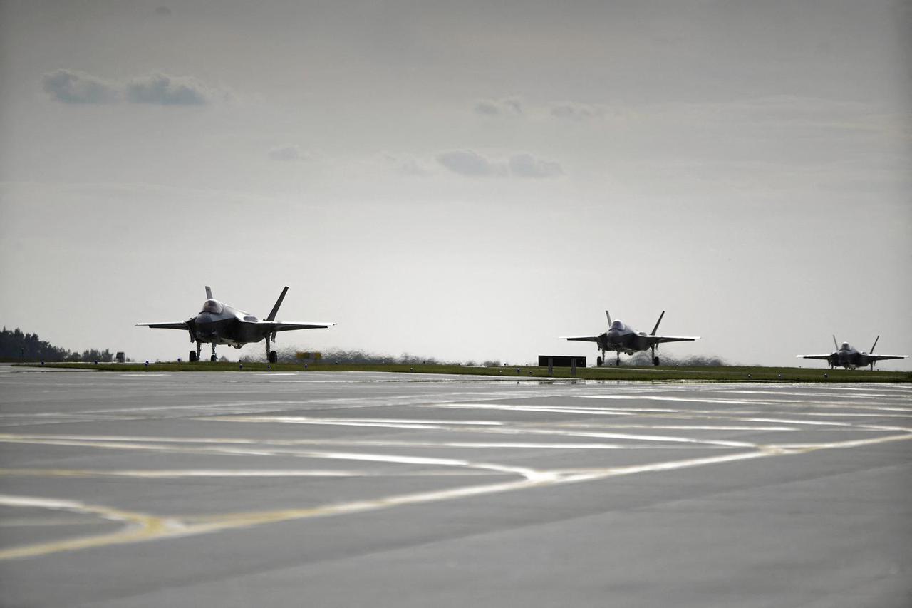 Newly delivered Polish Air Force F-35A Lightning II “Husarz” fighter jets, the first three aircraft purchased by Poland, taxi at the 32nd Tactical Air Base in Lask