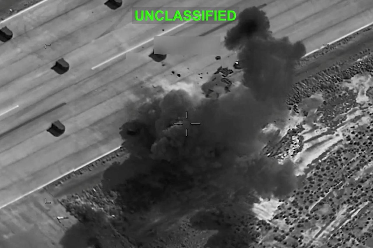 Smoke rises from explosions at an unknown location, following what U.S. Central Command (CENTCOM) said were strikes on Iranian military targets