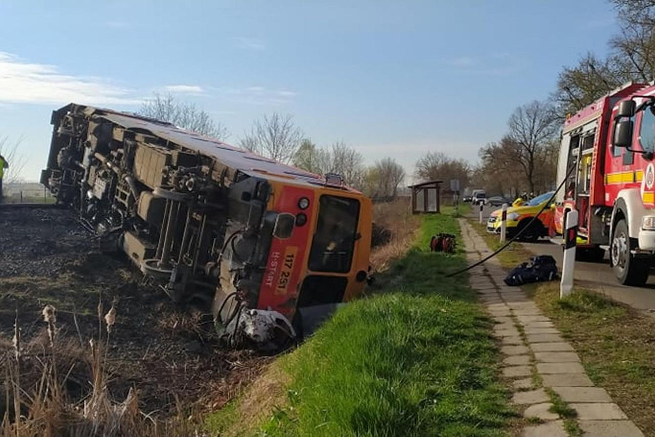 A derailed train is seen at a scene of an accident where a pick-up truck crashed into a train in Mindszent