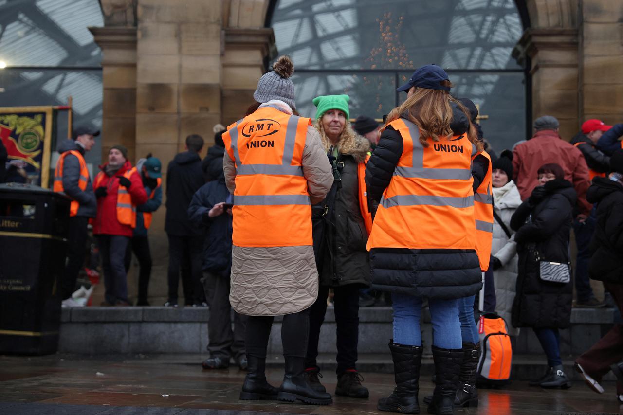 Rail workers strike over pay and terms, in Liverpool