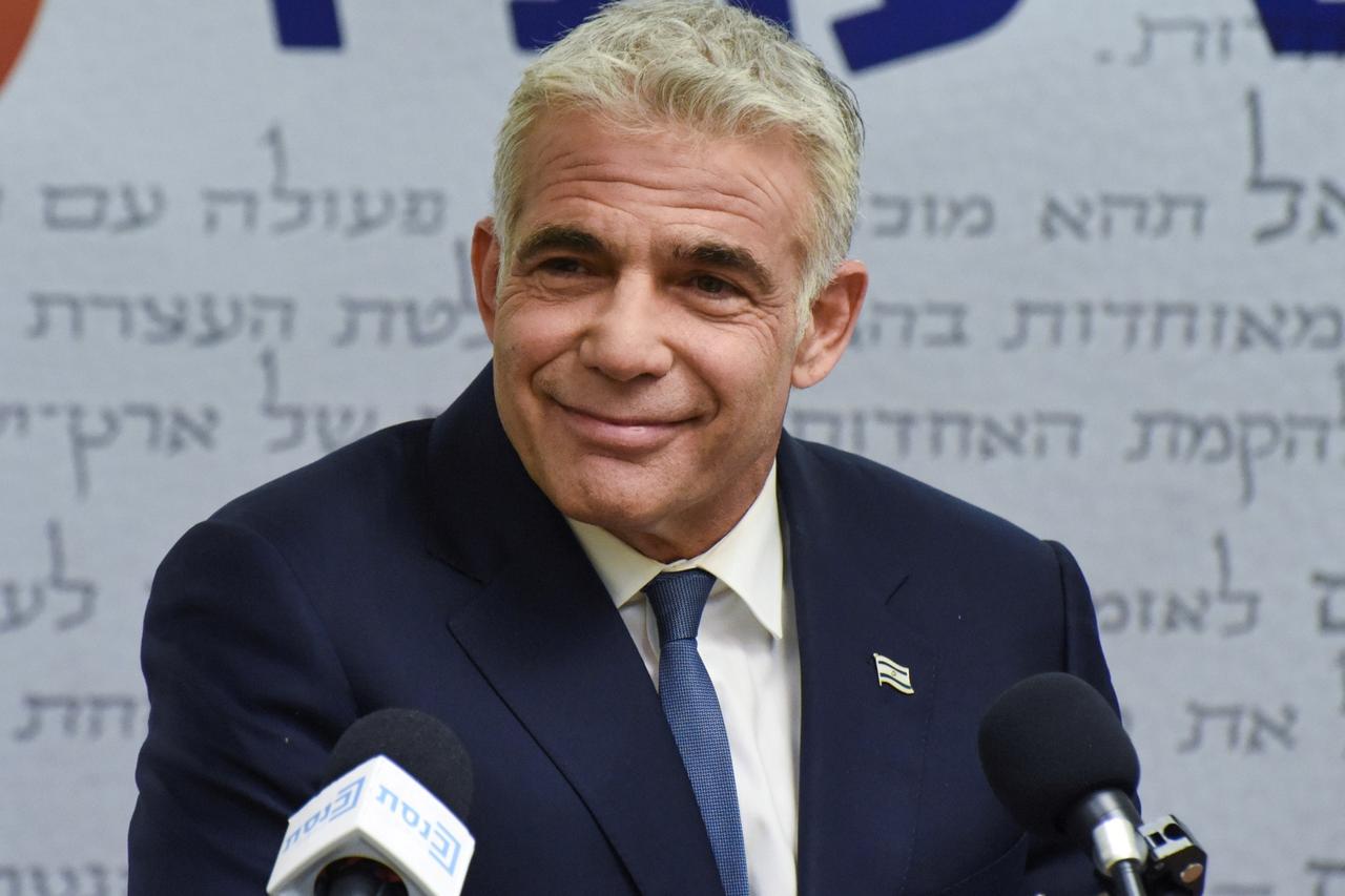 FILE PHOTO: Yair Lapid, leader of Yesh Atid party, delivers a statement in Jerusalem