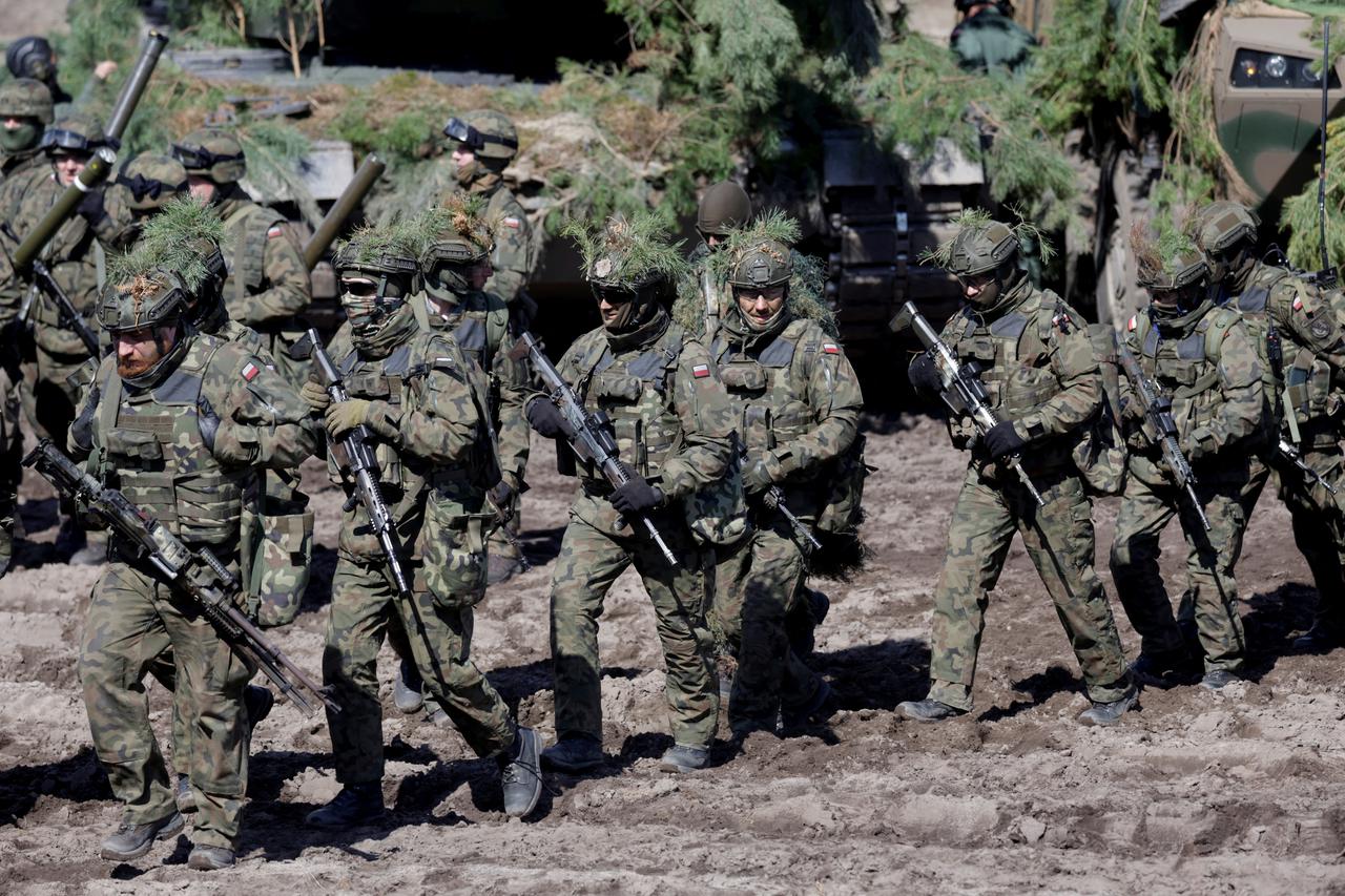 FILE PHOTO: Polish and U.S. troops participate in a joint military training in Nowa Deba