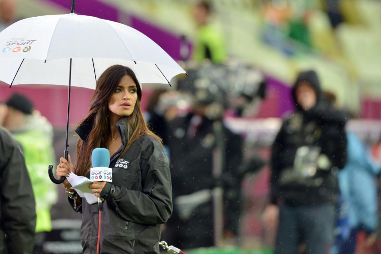'Spanish TV host and girlfriend of Spanish goalkeeper Iker Casillas Sara Carbonero is pictured prior to the Euro 2012 championships football match Spain vs Republic of Ireland on June 14, 2012 at the 
