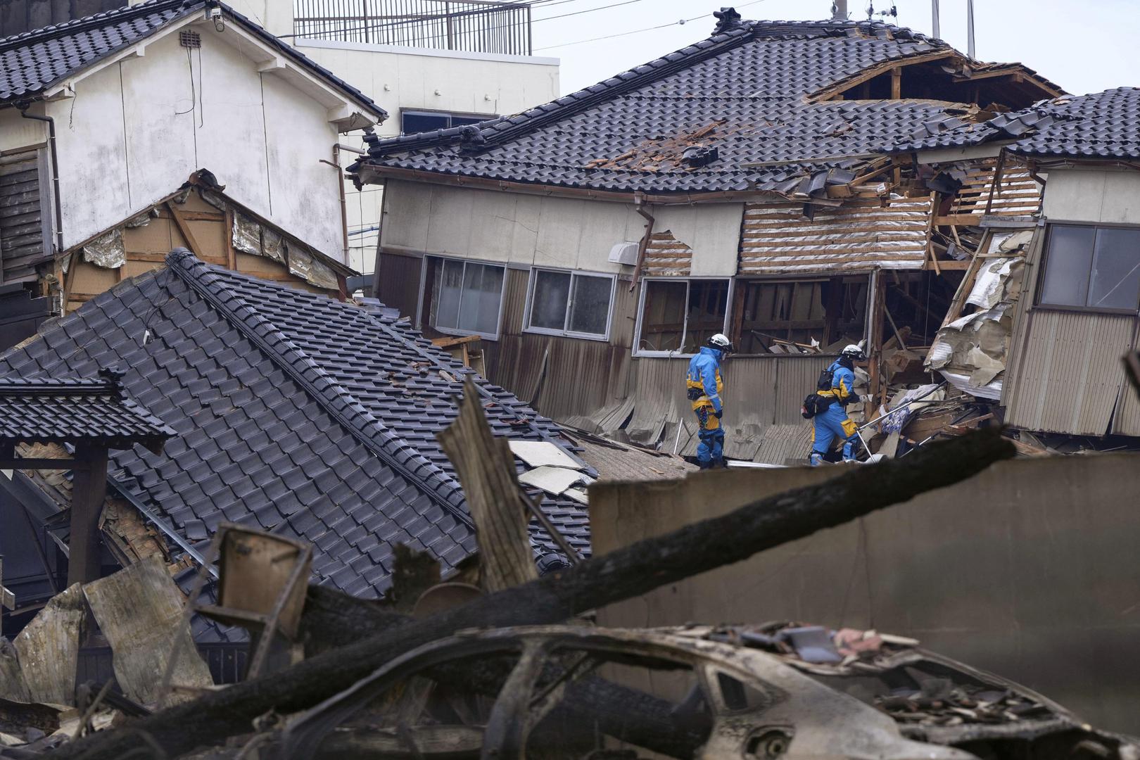 Police officers search missing people at a collapsed house caused by an earthquake in Wajima, Ishikawa prefecture, Japan January 2, 2024, in this photo released by Kyodo. Mandatory credit Kyodo/via REUTERS   ATTENTION EDITORS - THIS IMAGE HAS BEEN SUPPLIED BY A THIRD PARTY. MANDATORY CREDIT. JAPAN OUT. NO COMMERCIAL OR EDITORIAL SALES IN JAPAN. Photo: KYODO/REUTERS