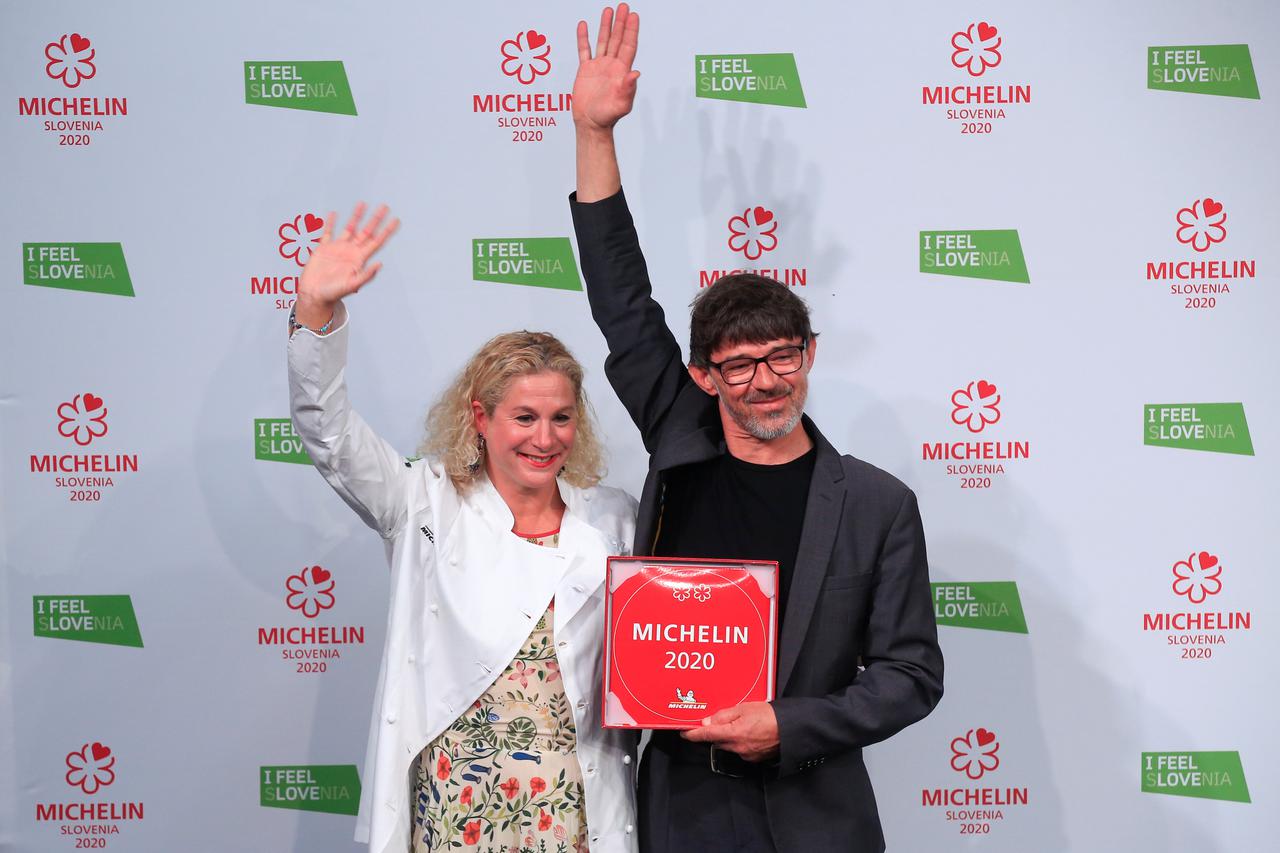 Ana Ros and her husband Valter Kramar celebrate after receiving 2 Michelin stars for their restaurant