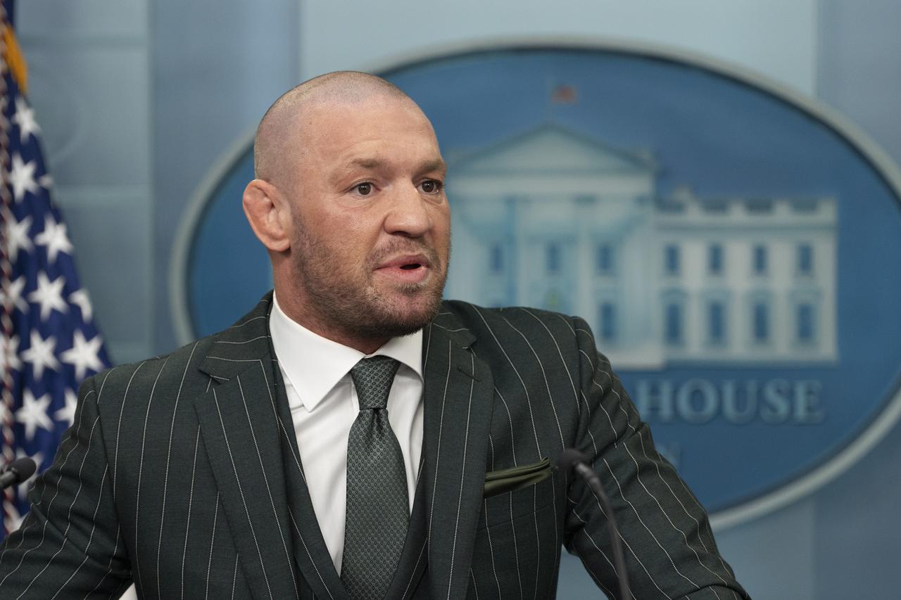 Irish boxer and mixed martial arts fighter Conor McGregor speaks to the media
