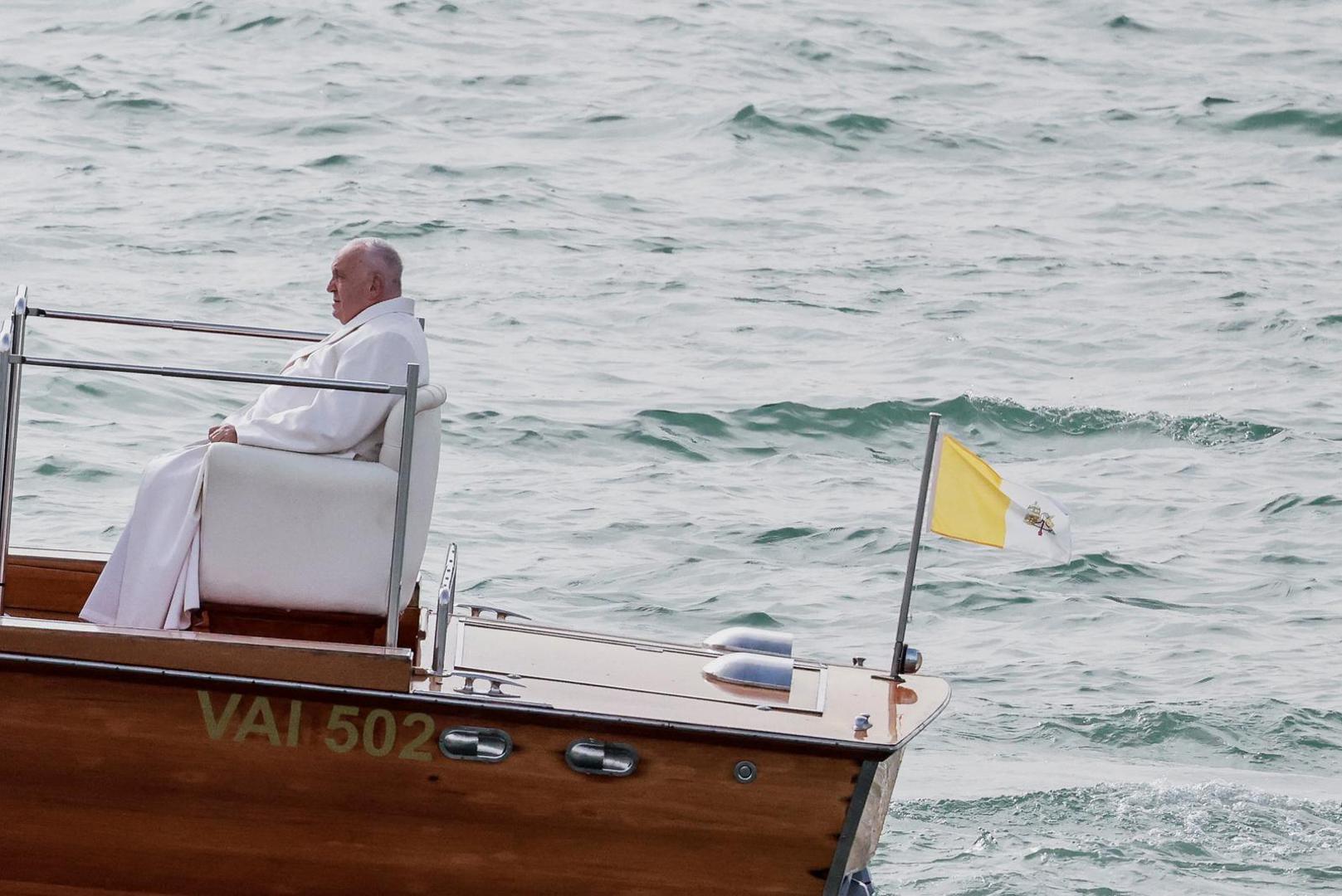 Pope Francis sits on a boat as he arrives on the day of a meeting with young people at the Square in front of the Basilica of Santa Maria della Salute, in Venice, Italy, April 28, 2024. REUTERS/Yara Nardi Photo: YARA NARDI/REUTERS