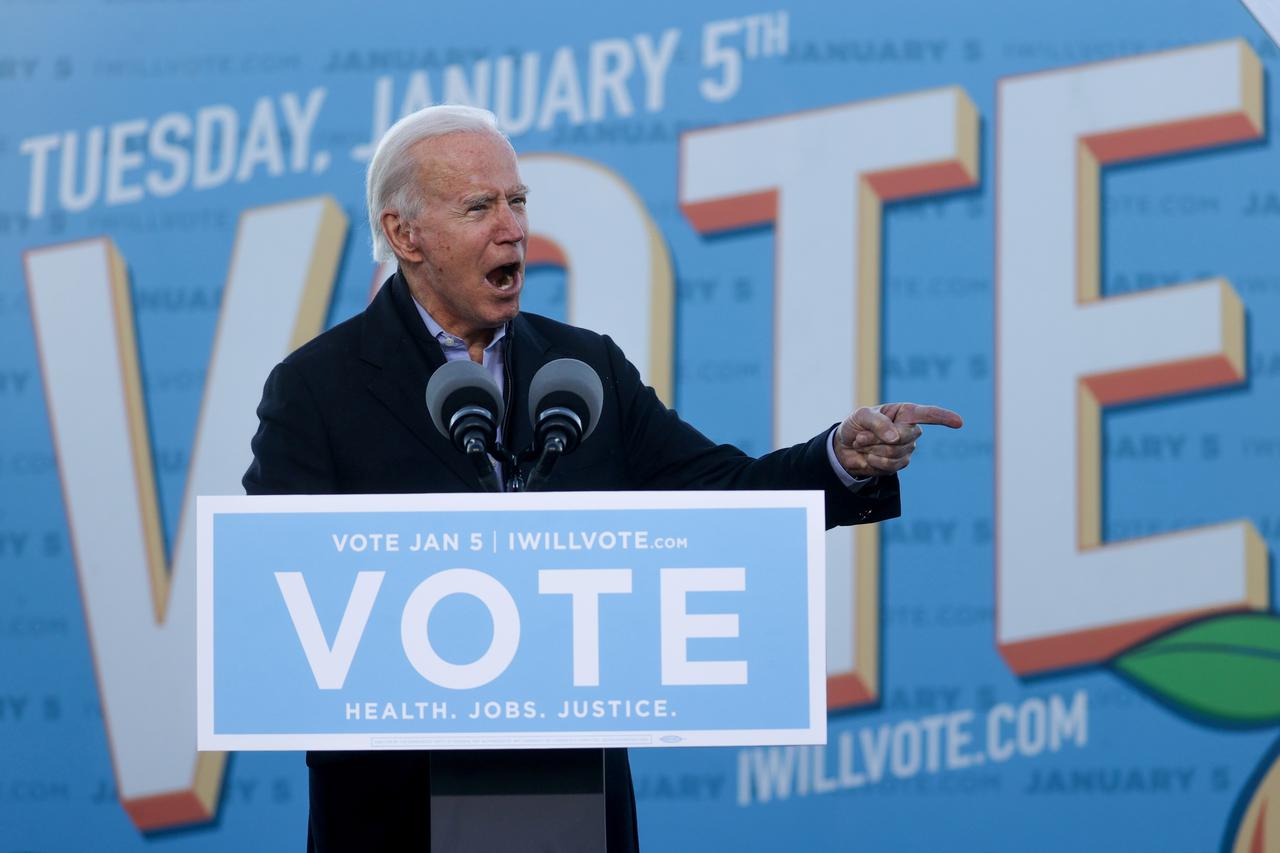 U.S. President-elect Biden campaigns for Democratic U.S. Senate candidates Ossoff and Warnock at a rally ahead of runoff elections in Atlanta, Georgia