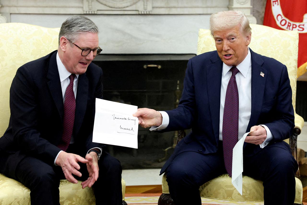 FILE PHOTO: U.S. President Donald Trump meets British Prime Minister Keir Starmer, in Washington, D.C.