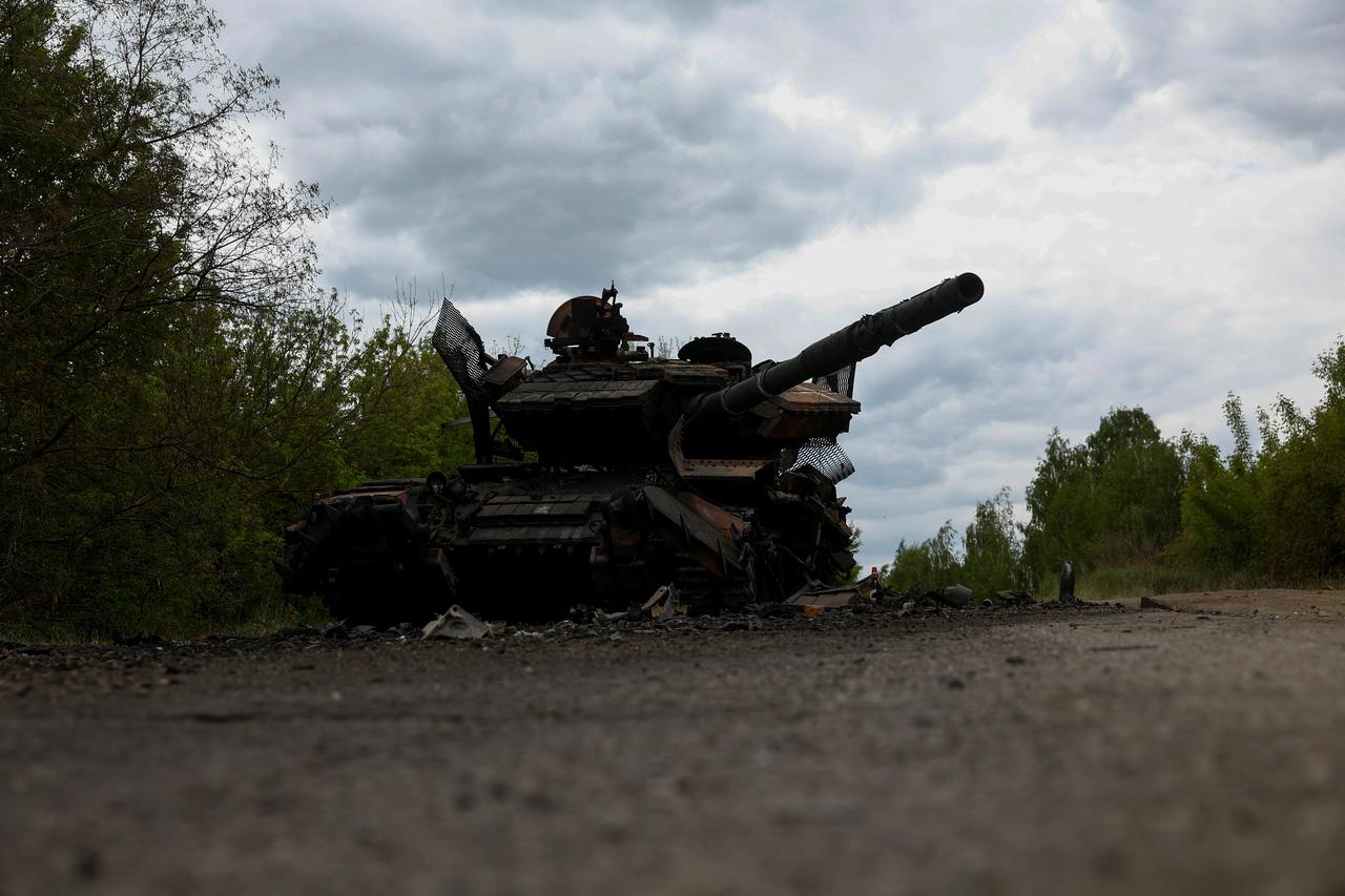 Destroyed tank is seen on a road in Kharkiv region