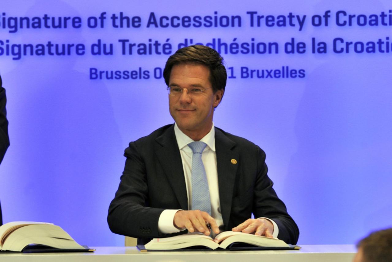 'Netherlands Prime Minister Mark Rutte signs Croatia\'s EU accession treaty, on the sidelines of an European Union summit at the EU headquarters on December 9, 2011 in Brussels. Croatia signed an EU a