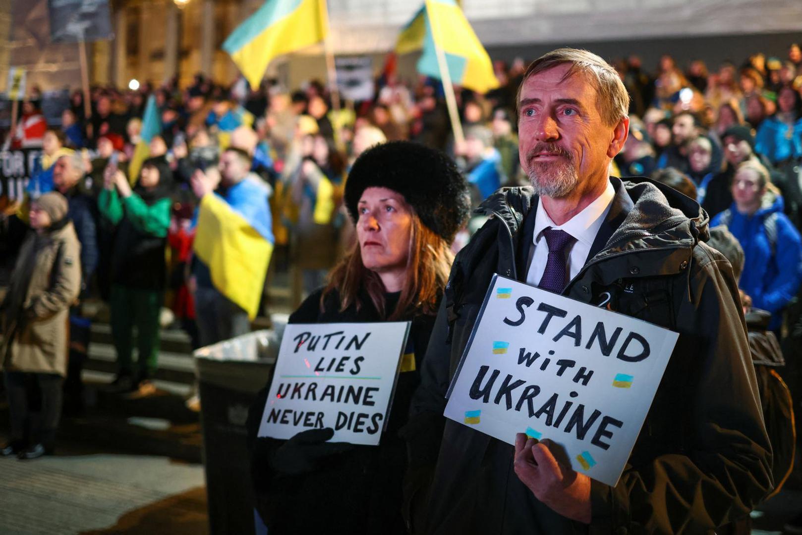People attend a vigil for Ukraine held on the anniversary of the conflict with Russia, at Trafalgar Square in London, Britain February 23, 2023. REUTERS/Henry Nicholls Photo: Henry Nicholls/REUTERS