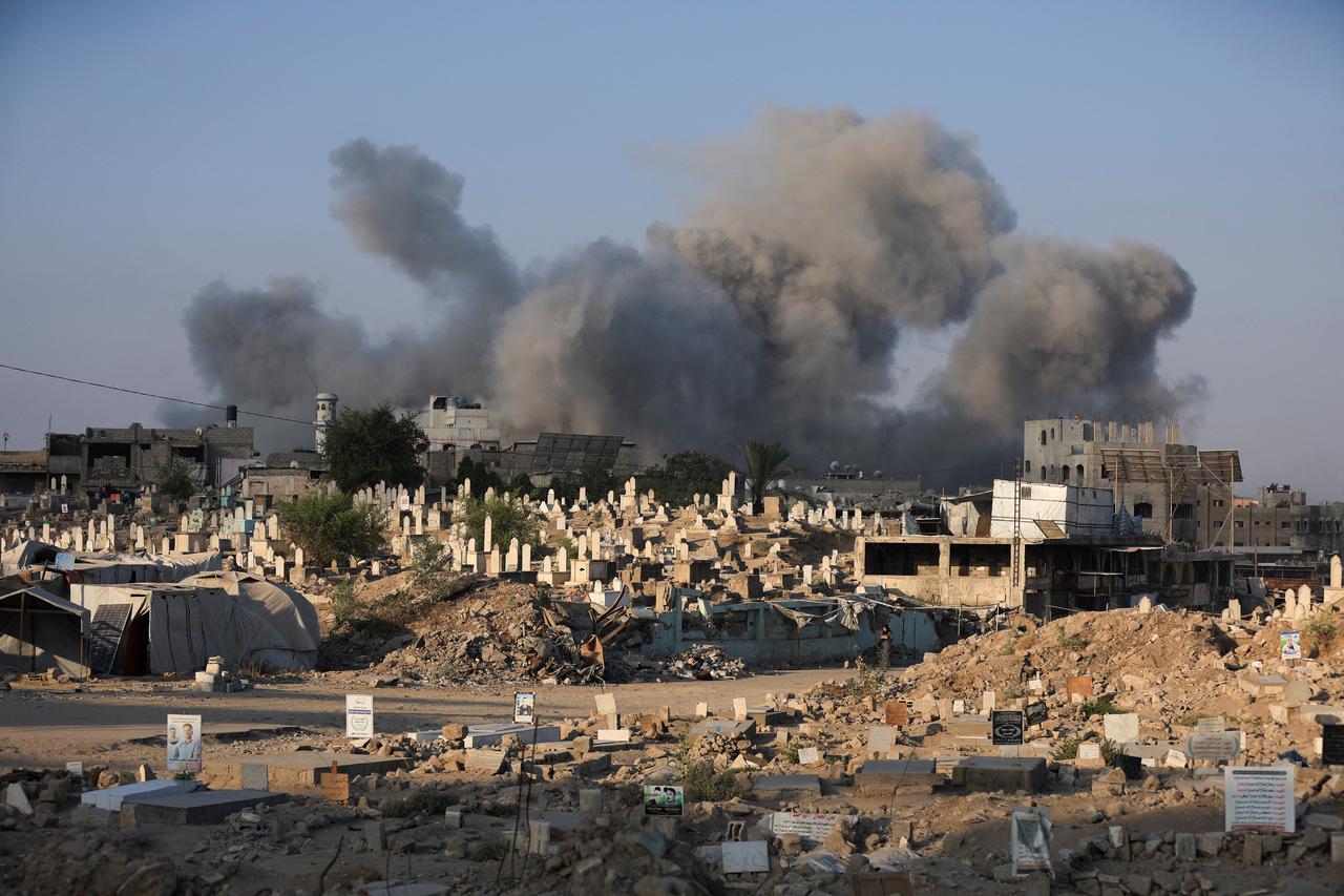 Smoke rises following an Israeli strike, in Gaza City