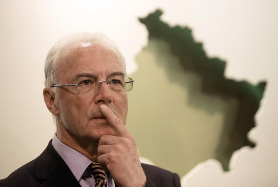 \'German football legend Franz Beckenbauer listens to questions during a news conference in Kosovo\'s capital Pristina March 4, 2011. REUTERS/Hazir Reka (KOSOVO - Tags: POLITICS SPORT SOCCER)\'