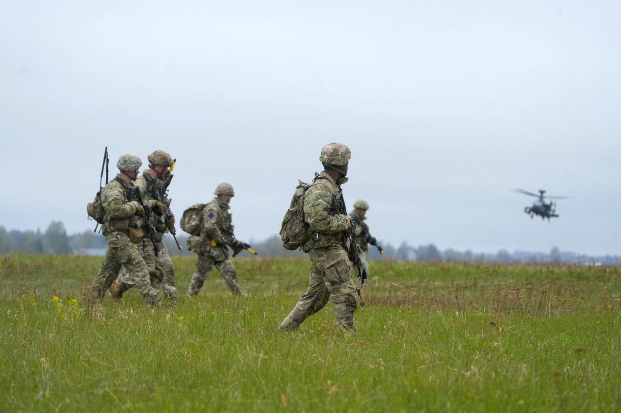 FILE PHOTO: British and U.S. paratroopers attend Swift Response military exercise near Nurmsi