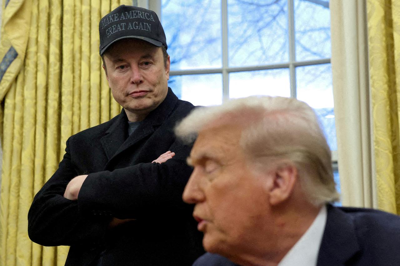 FILE PHOTO: Elon Musk and President Donald Trump are shown in the Oval Office in Washington