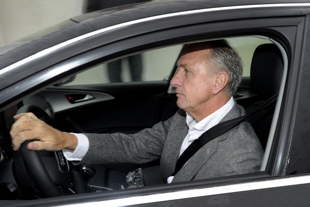 'Johan Cruyff, board member of Ajax football team, drives to attend a Council meeting of the football club, in Amsterdam on November 20, 2011. Louis van Gaal will return to Ajax as general manager in 