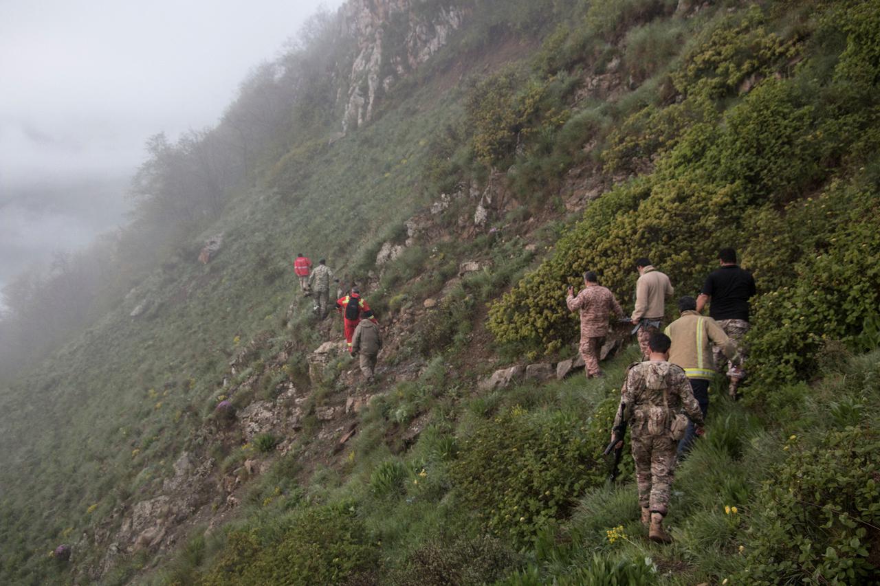 FILE PHOTO: Rescue team works following a crash of a helicopter carrying Iran's President Ebrahim Raisi, in Varzaqan