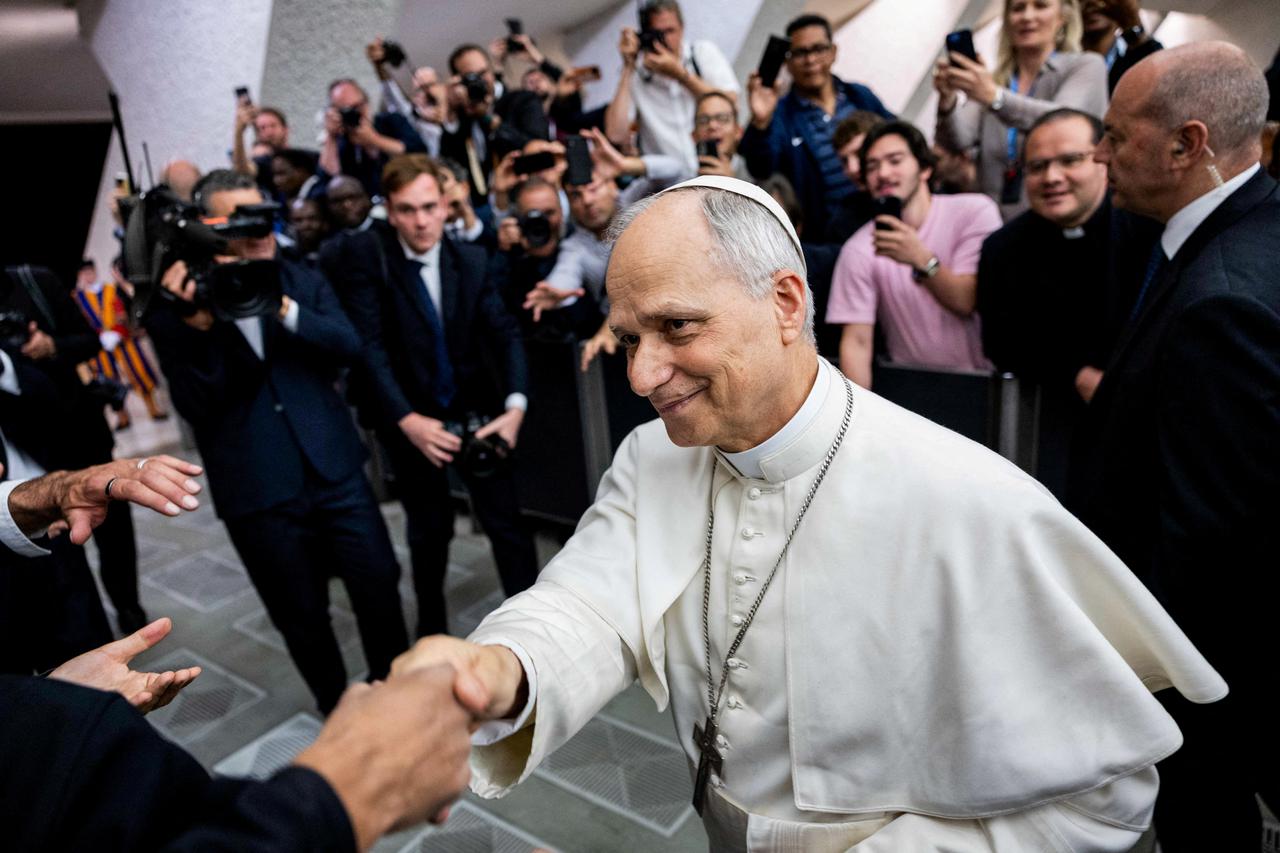 FILE PHOTO: Pope Leo XIV holds an audience with representatives of the media in Paul VI hall at the Vatican