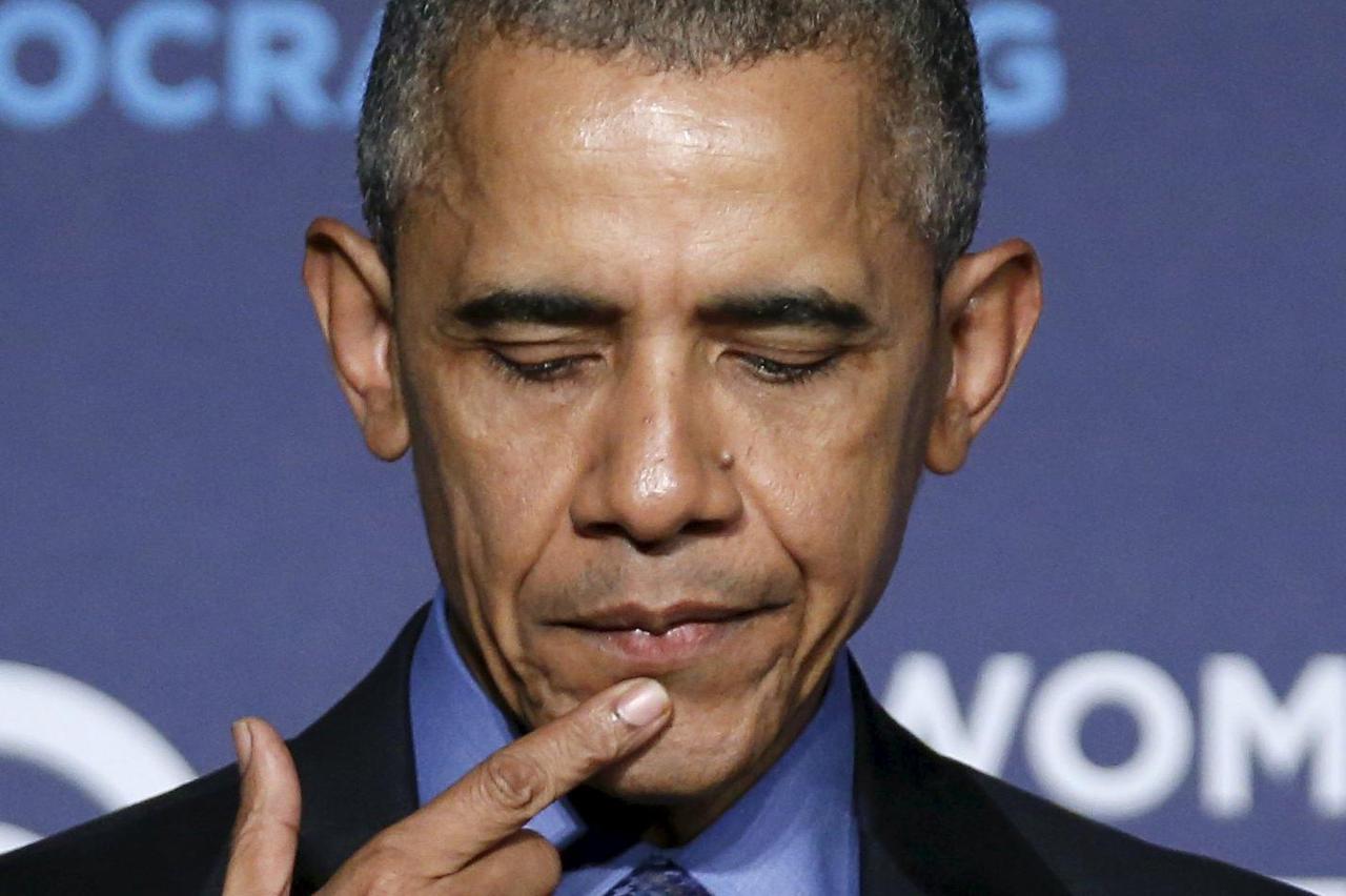 United States President Barack Obama pauses while speaking at the Democratic National Committee's Women's Leadership Forum's 22nd annual conference in Washington October 23, 2015.           REUTERS/Gary Cameron
