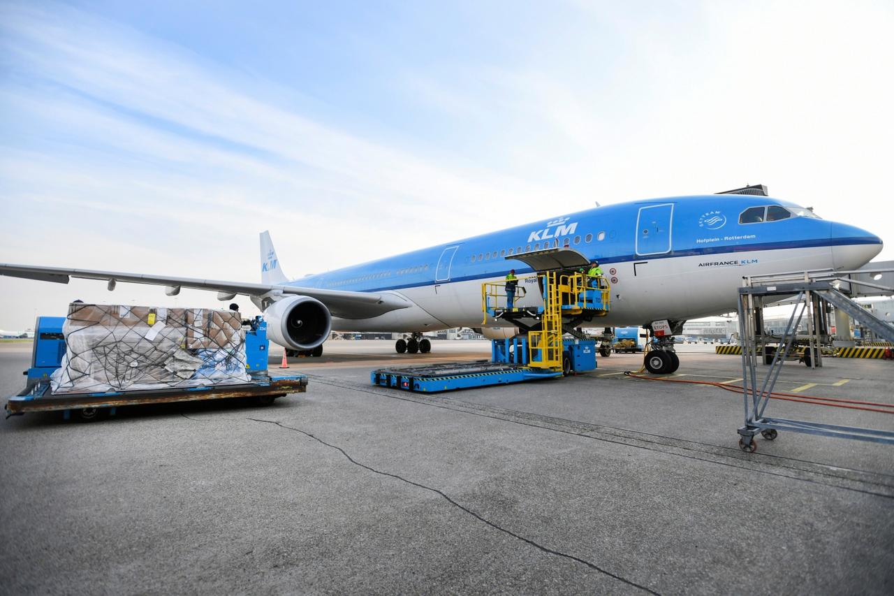 Cooled packages are being transported by airplane at Amsterdam's Schiphol Airport