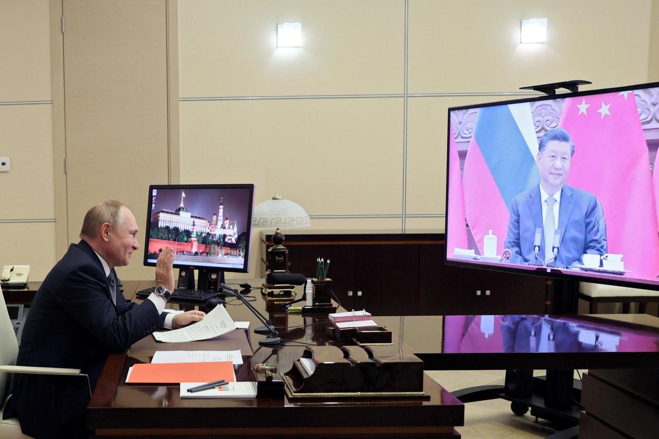 Russian President Vladimir Putin holds talks with Chinese President Xi Jinping outside Moscow