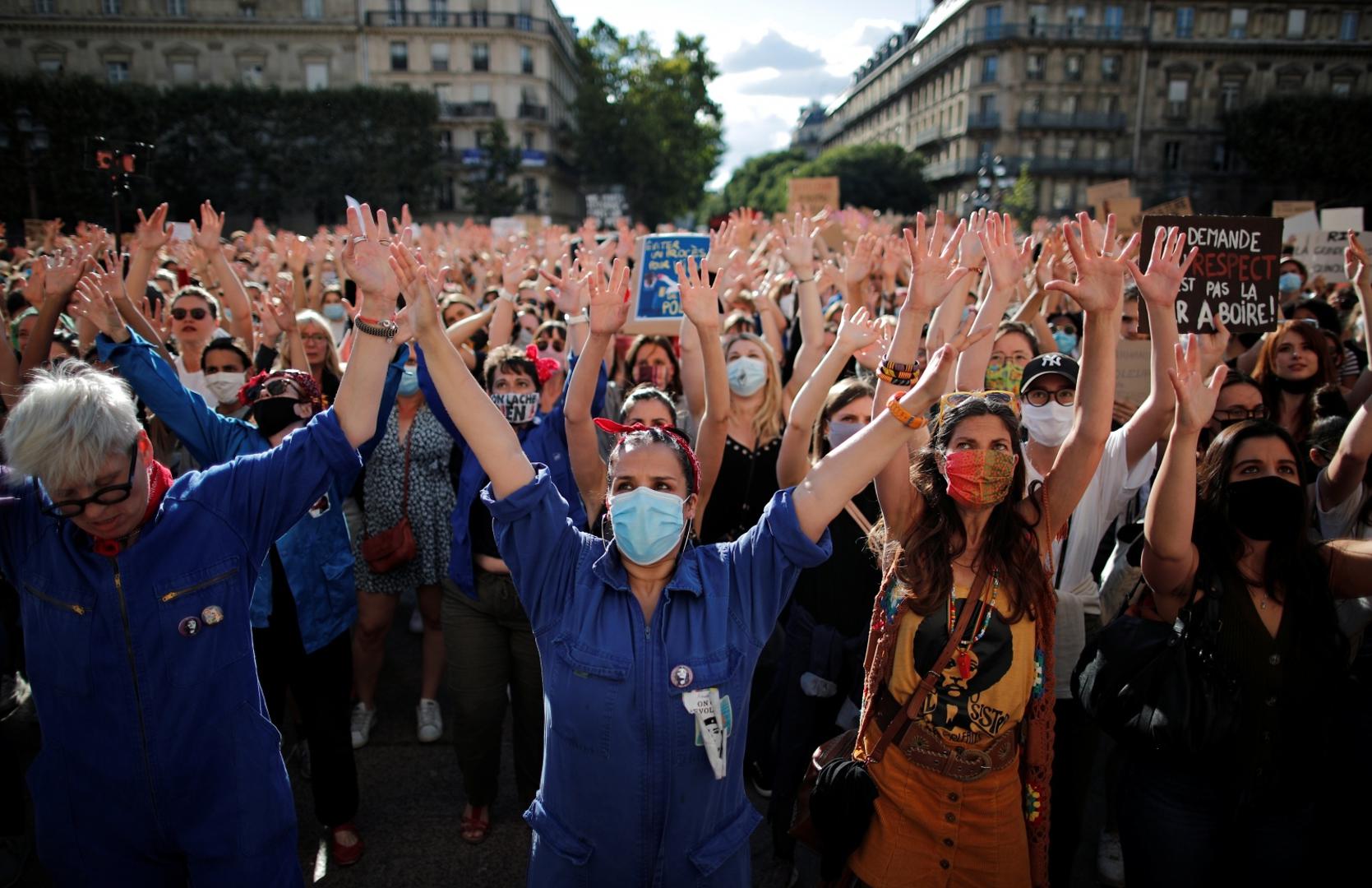 Feminist activists demonstrate against new government appointments in Paris Feminist activists gesture as they demonstrate against the appointments of French Interior Minister Gerald Darmanin and Justice Minister Eric Dupond-Moretti in the new French government, in front of the city hall in Paris, France, July 10, 2020. REUTERS/Benoit Tessier BENOIT TESSIER