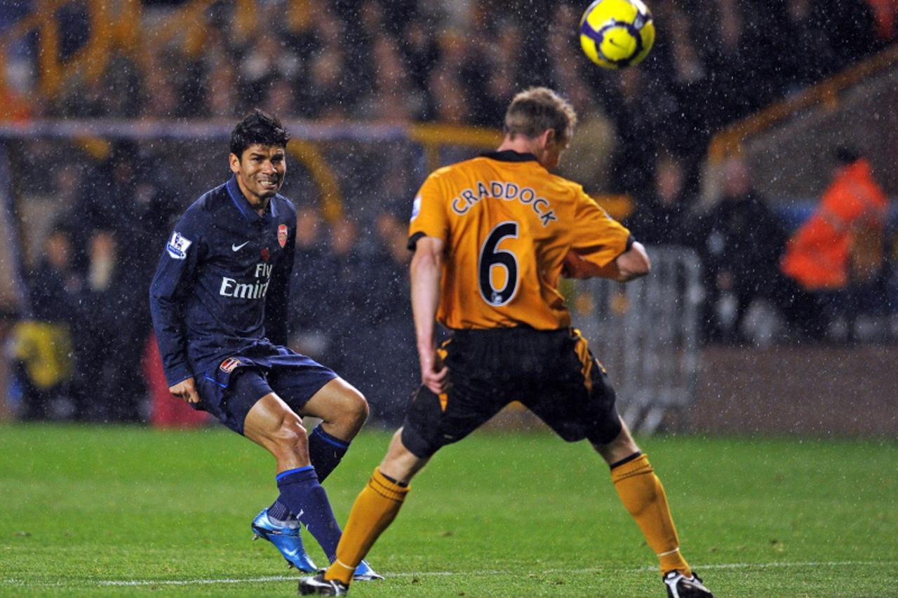 'Arsenal\'s Brazilian-Croatian forward Eduardo scores during the English Premier League football match between Wolverhampton Wanderers and Arsenal at Molineux Stadium, Wolverhampton, central England, 