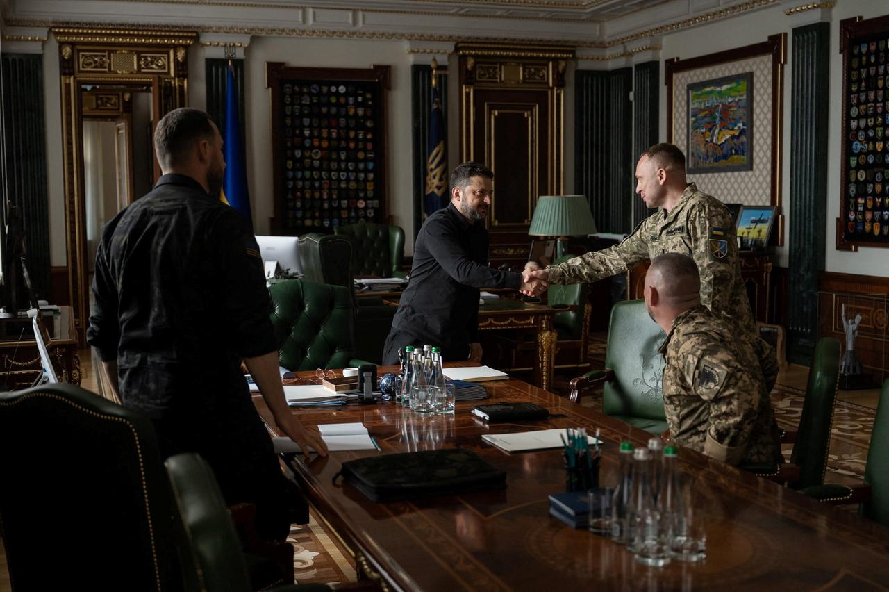 Ukraine's President Volodymyr Zelenskiy meets with Major General Mykhailo Drapatyi