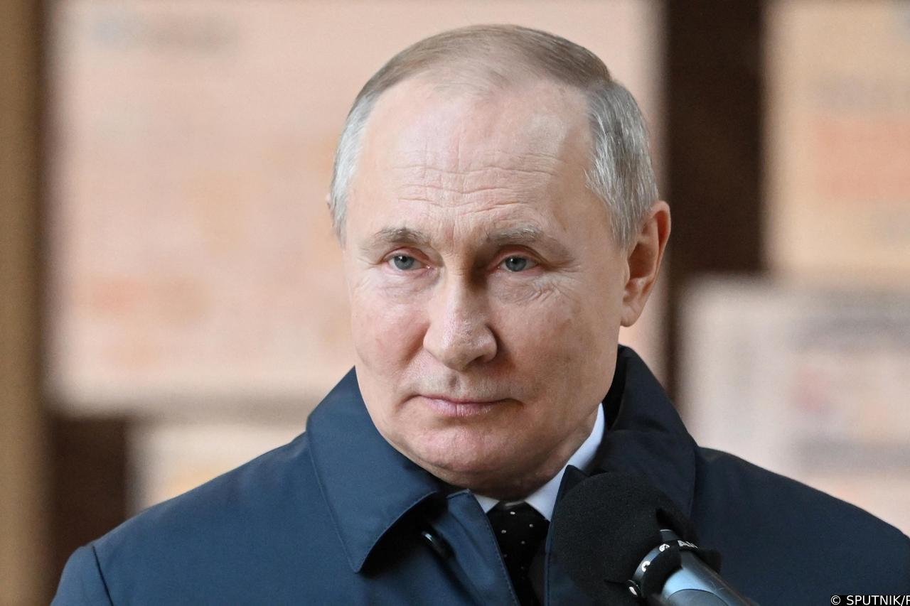Russian President Vladimir Putin visits the construction site of the National Space Agency in Moscow