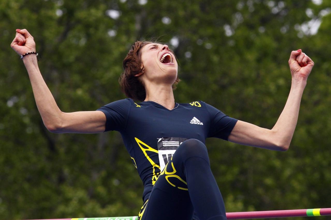 'Blanka Vlasic of Croatia celebrates clearing the bar at 1.94 meters winning the women\'s high jump at the Diamond League Adidas Grand Prix in New York, May 25, 2013. REUTERS/Gary Hershorn (UNITED STA