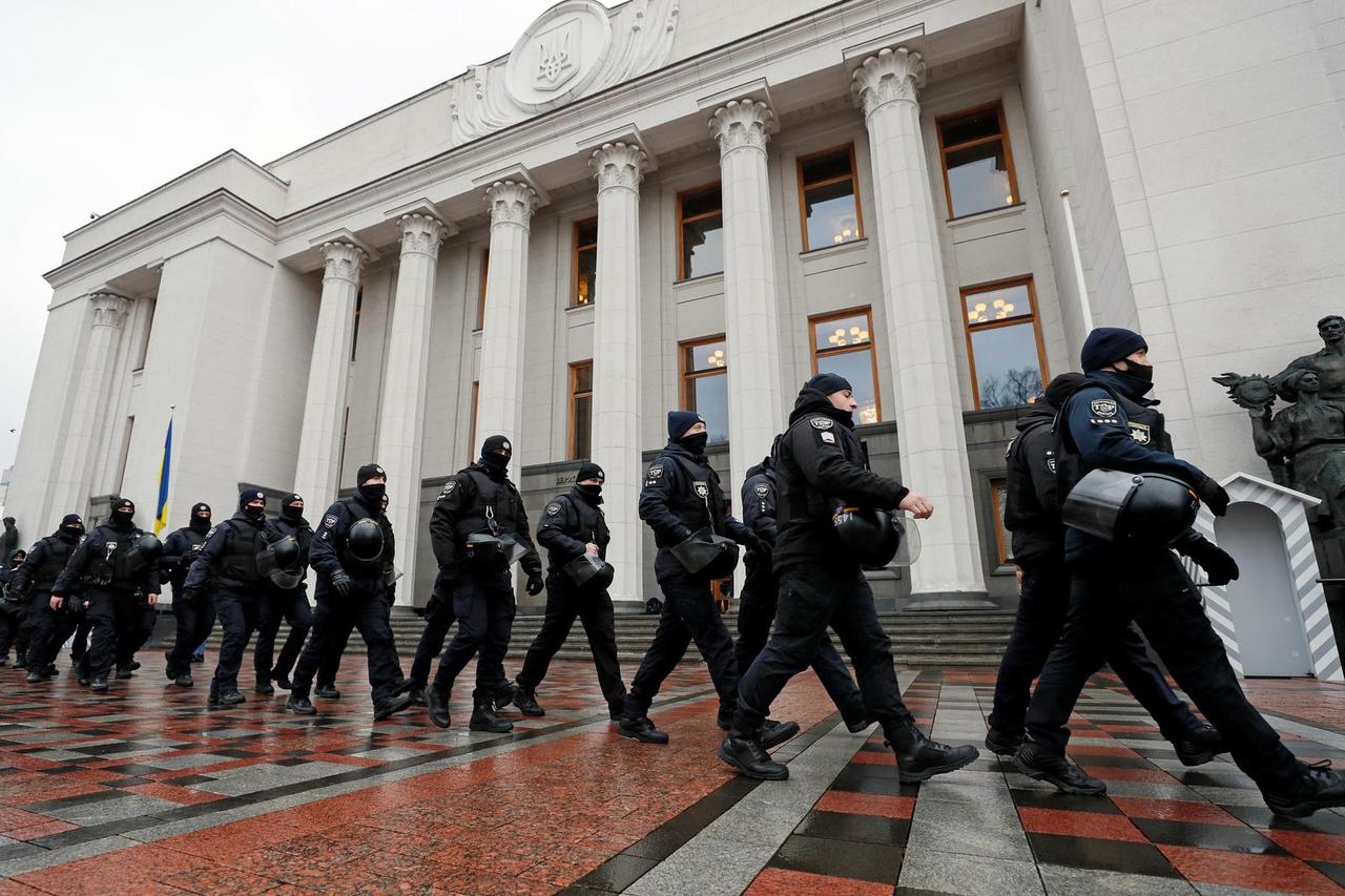 Police guard in front of the parliament building in Kyiv
