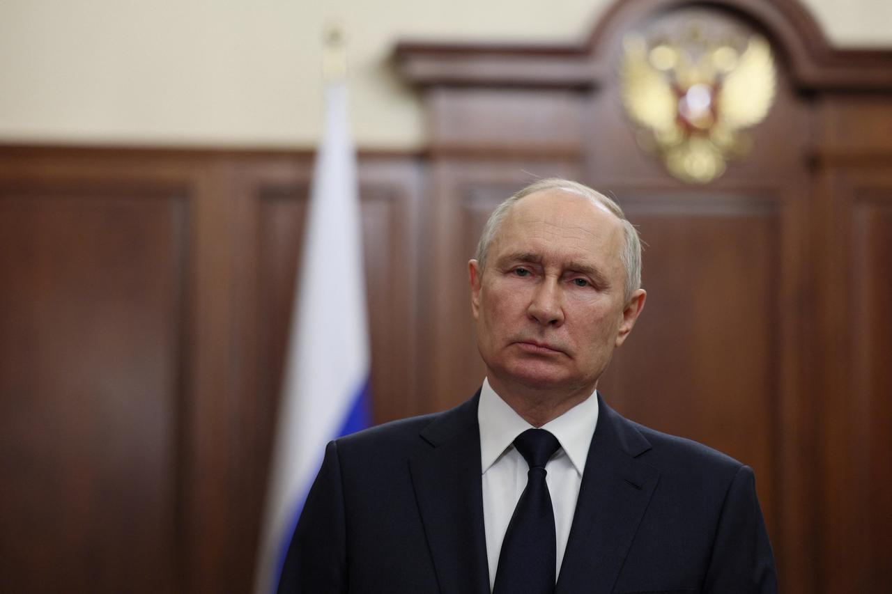Russian President Vladimir Putin gives a televised address in Moscow