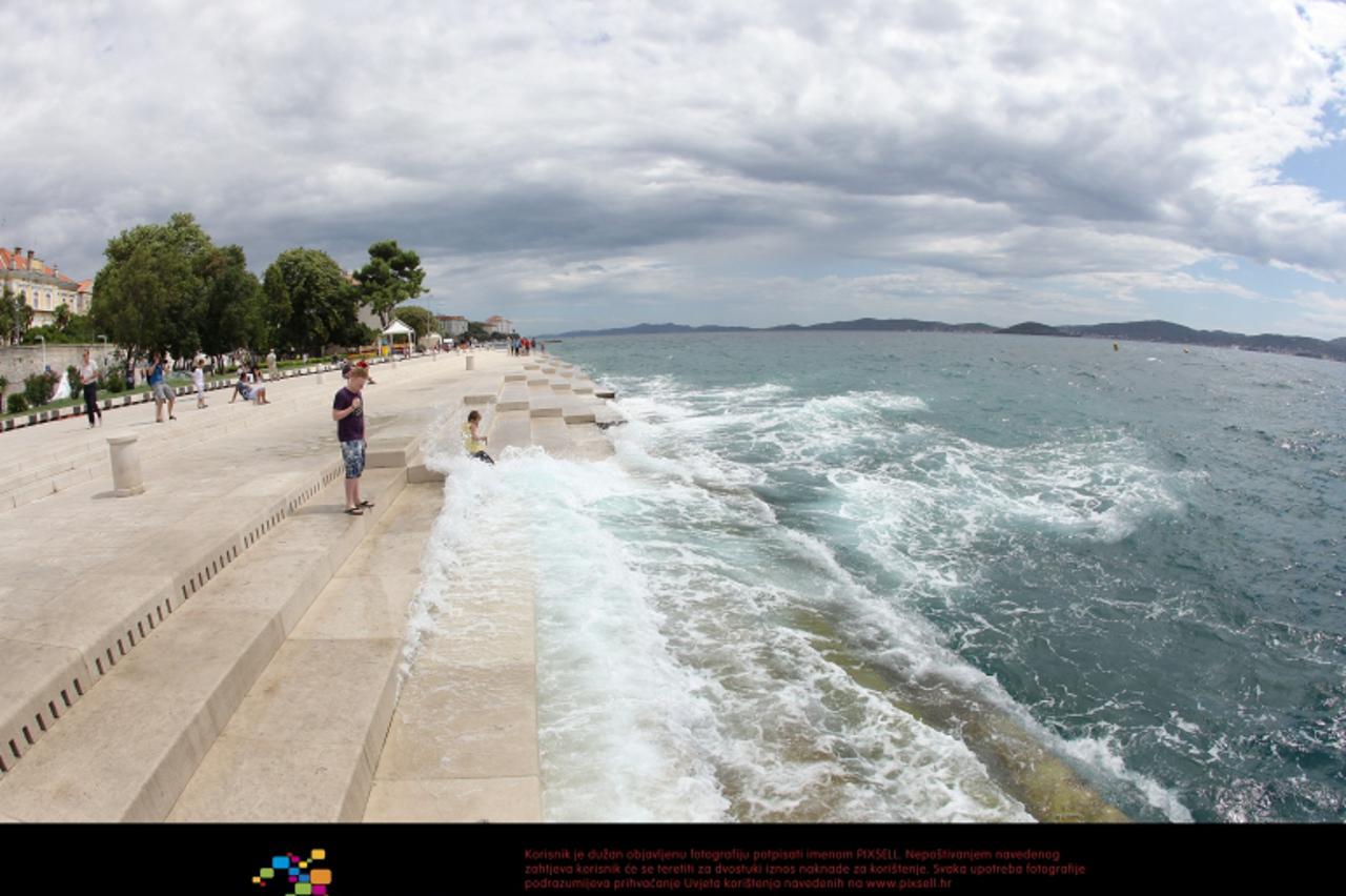 \'20.07.2011., Zadar - Jaka tramontana puhala je sve do poslijepodneva. U to vrijeme zvuk Morskih orgulja najjace se cuje dok valovi udaraju u zadarsku rivu. Photo: Filip Brala/PIXSELL\'
