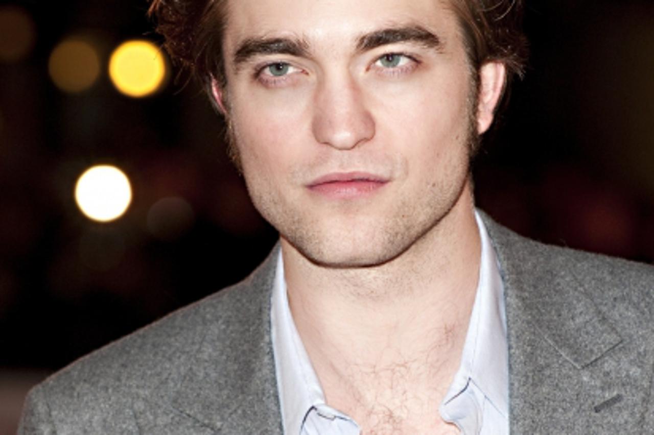 'Robert Pattinson arriving at the UK Premiere of Remember Me, Odeon Cinema, Leicester Square, London. Photo: Press Association/Pixsell'