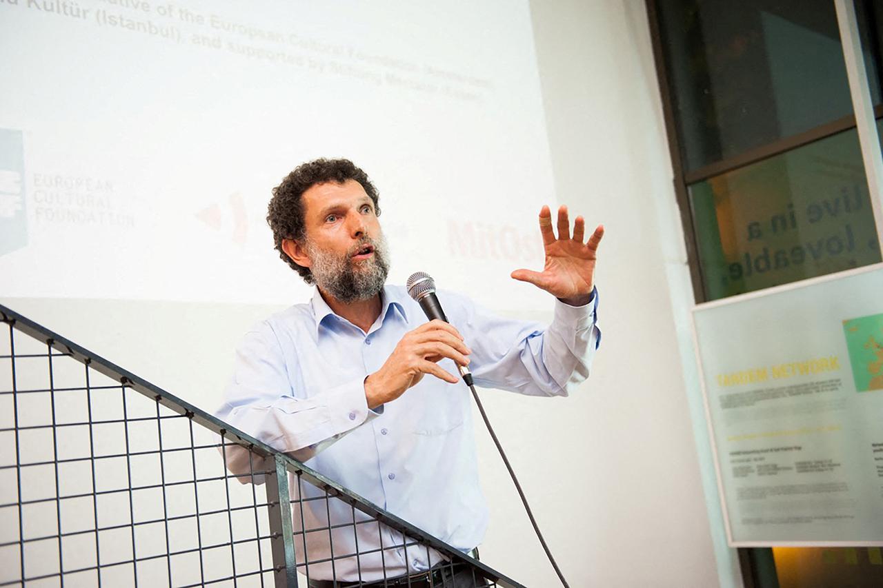 Turkish philanthropist Kavala speaks during an event in an undated handout photograph