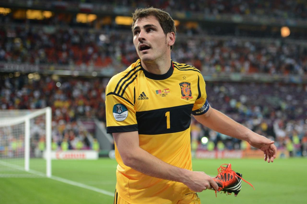 'Spanish goalkeeper Iker Casillas celebrates at the end of the penalty shoot out of the Euro 2012 football championships semi-final match Portugal vs. Spain on June 27, 2012 at the Donbass Arena in Do