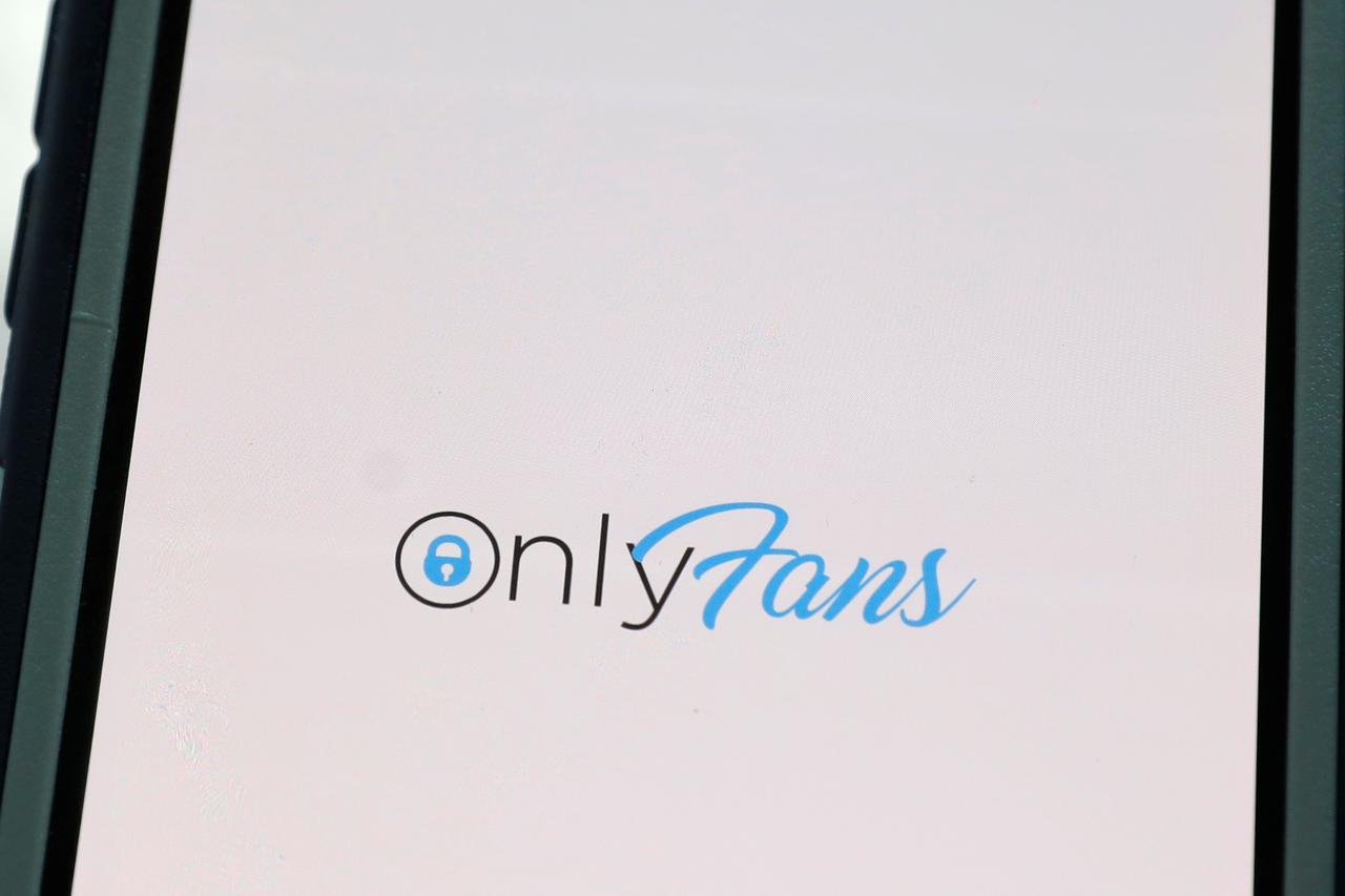 The logo for OnlyFans is seen on a device in this photo illustration in Manhattan, New York City