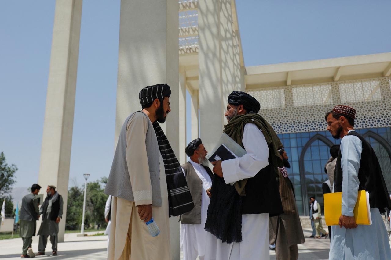 Taliban members are seen at Kabul University in Kabul
