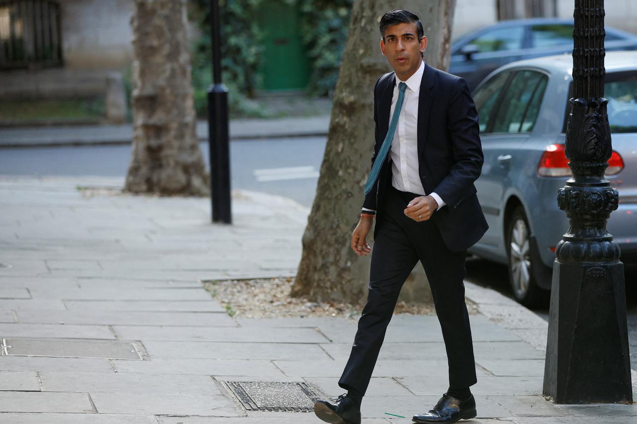 Former Chancellor of the Exchequer Rishi Sunak walks in London