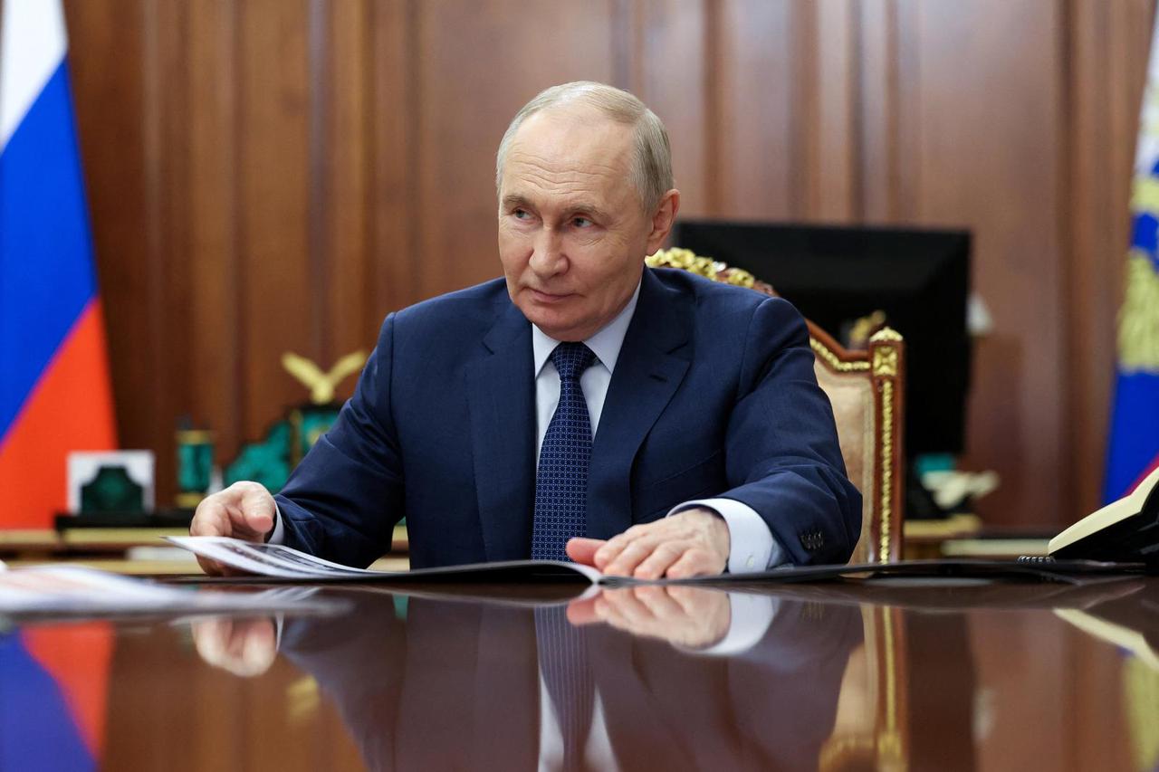 Russian President Putin meets General Director of KAMAZ Sergei Kogogin in Moscow