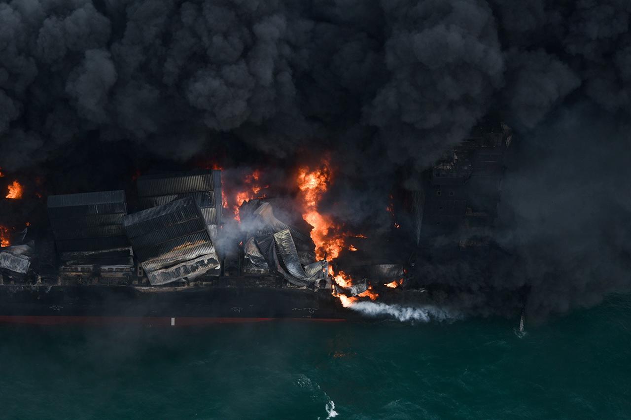 Smoke rises from a fire onboard the MV X-Press Pearl container in the seas off the Colombo Harbour in Ja-Ela